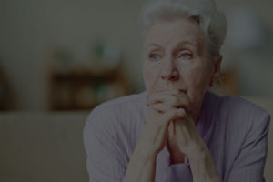 Elderly woman worried about housing